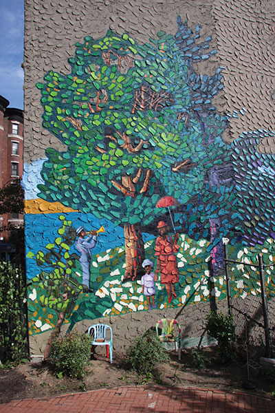 After restoration of "Homage to Seurat: La Grande Jatte in Harlem," by artist Eva Cockcroft. Photo by Camille Perrottet