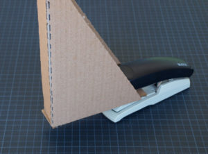 making cardboard corners for packing pictures